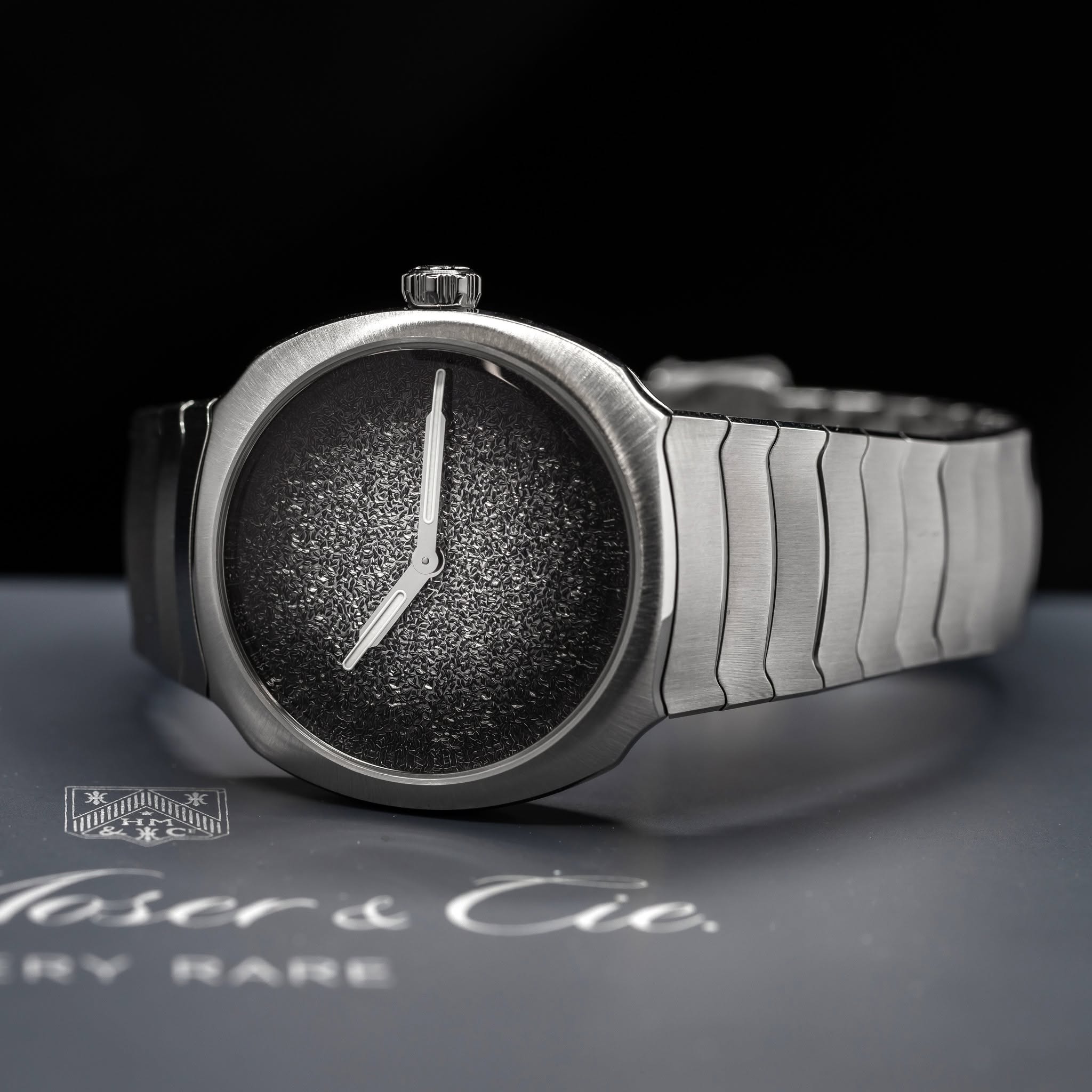 May be an image of wrist watch and text