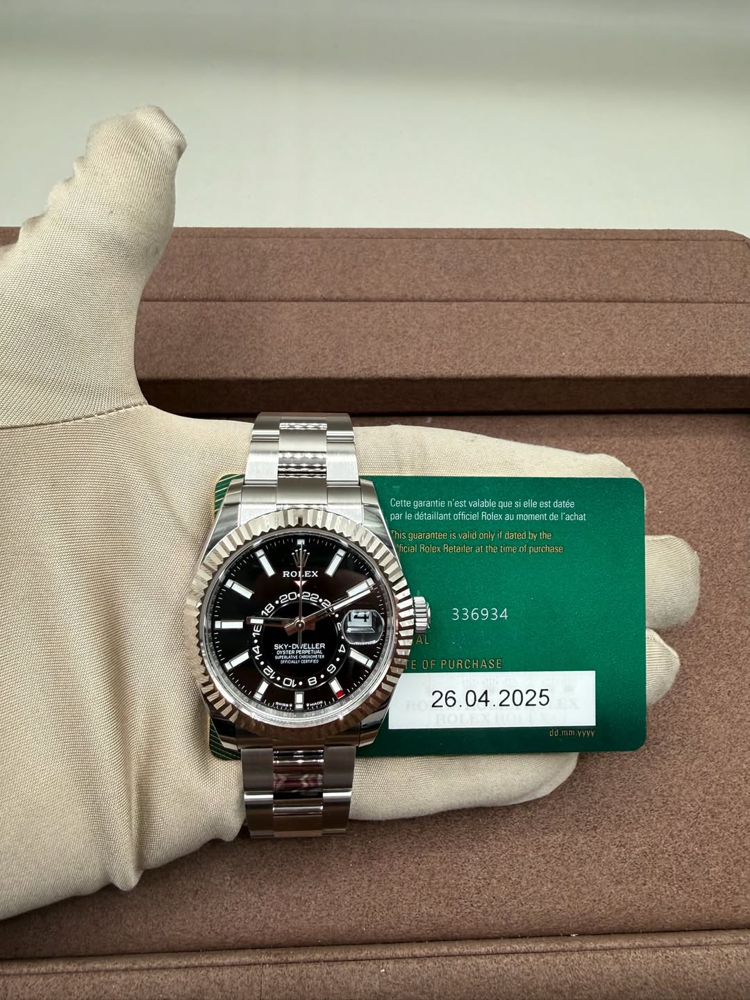 May be an image of wrist watch and text