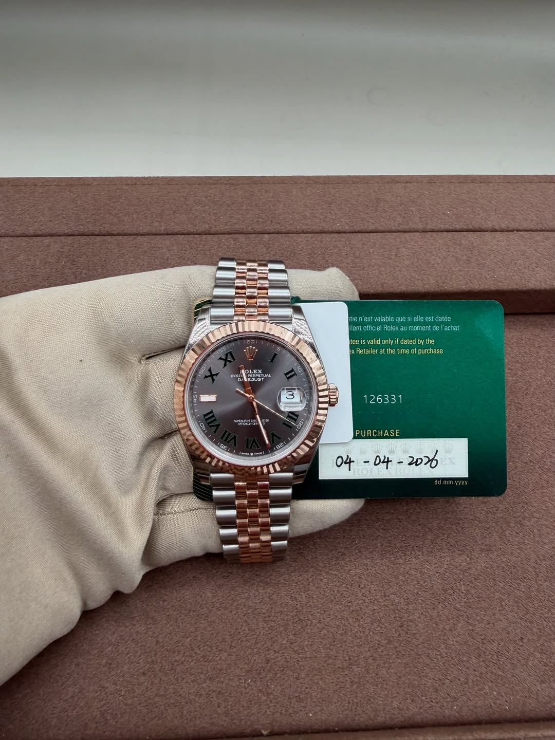 May be an image of wrist watch and text
