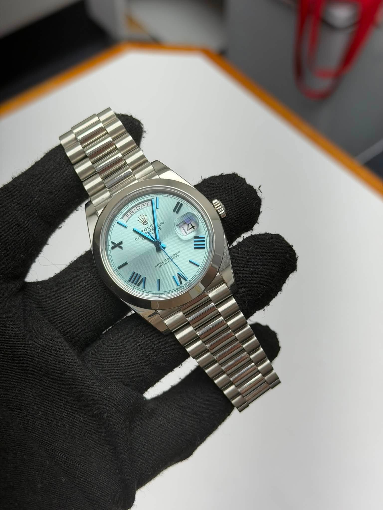May be an image of wrist watch and text