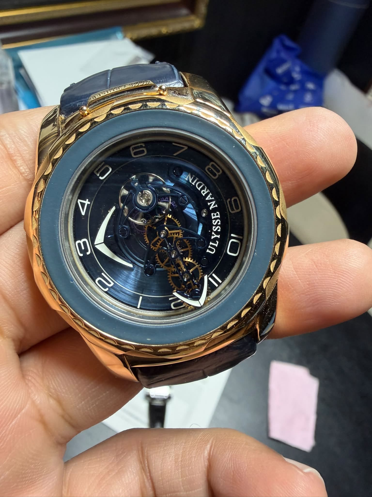 May be an image of wrist watch and text