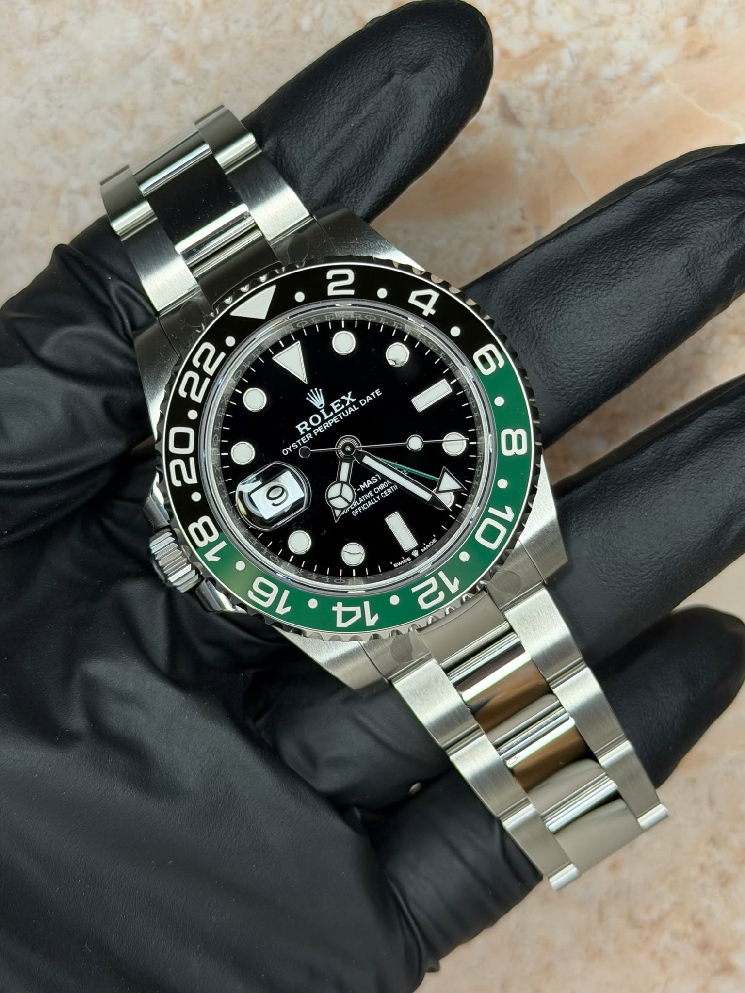 May be an image of wrist watch and text