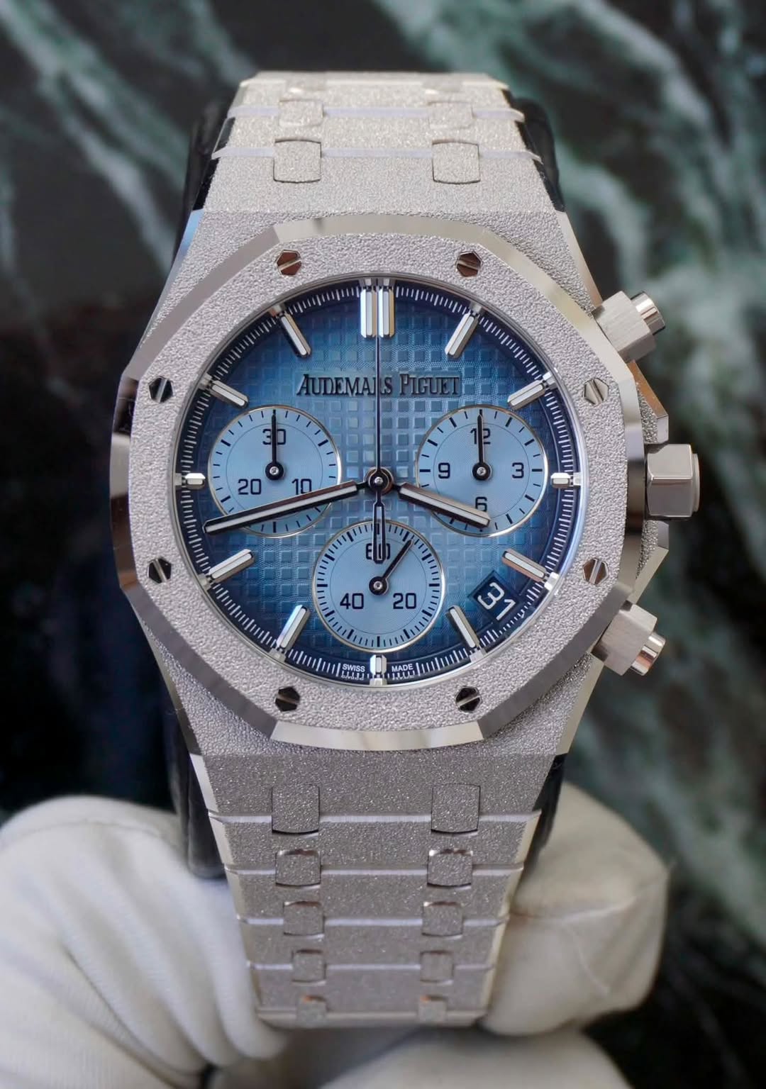 May be an image of wrist watch and text