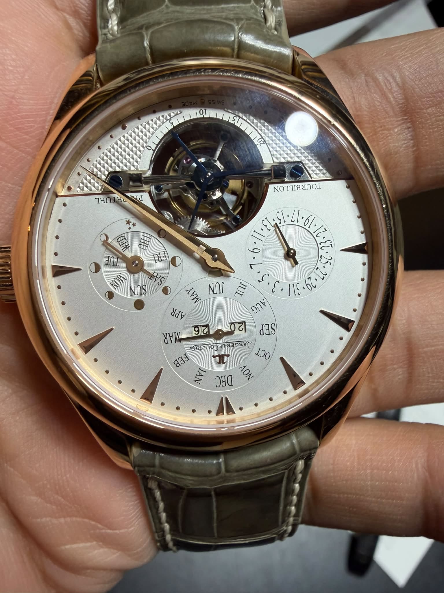 May be an image of wrist watch and text