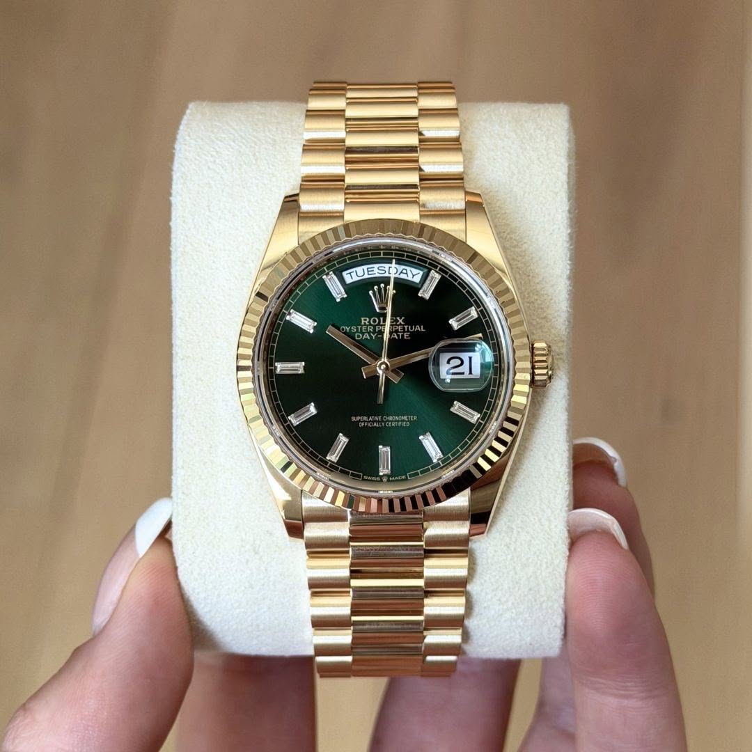 May be an image of wrist watch and text