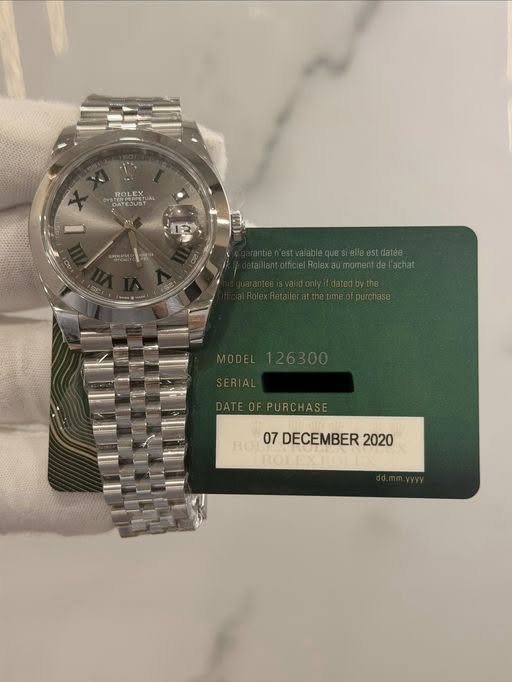 May be an image of wrist watch and text that says 'ROLE 1 CoU achat R07DECEMBER2020 RO 07 DECEMBER 2020'