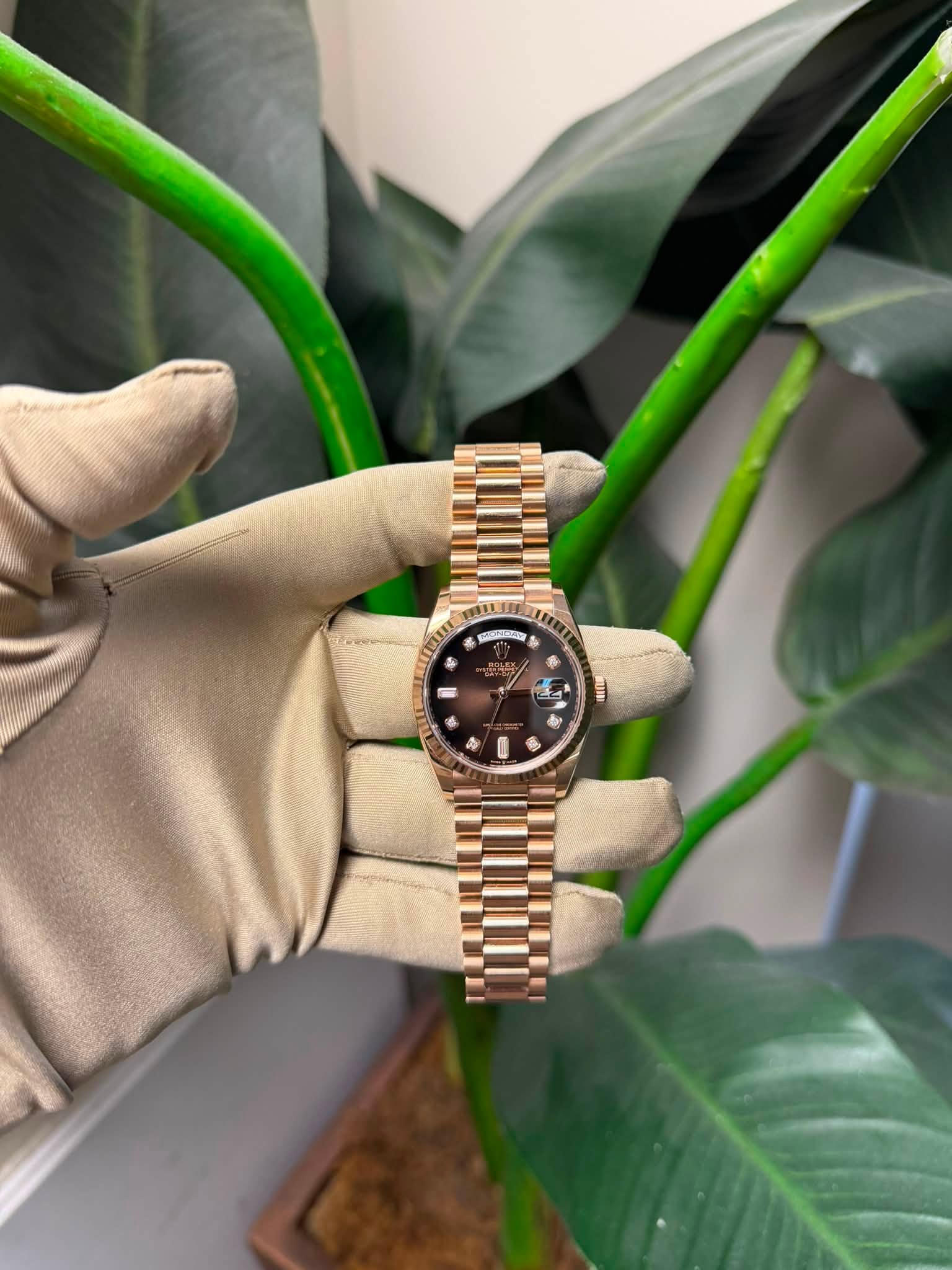 May be an image of wrist watch and text