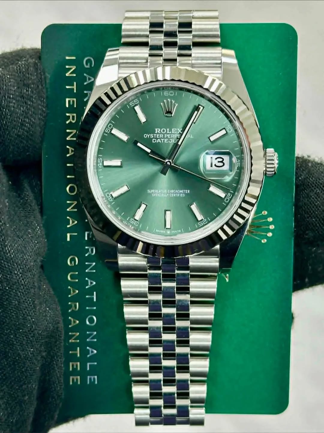 May be an image of wrist watch and text that says '60 W ROLEX EX OYST STERPERP RPERPU RE DATEJU I 10 10 13 M ומובטמציוסו NTERN ER ٧ GARK S5 S0 SE SE ERNATIONALE SLPERLATMA…