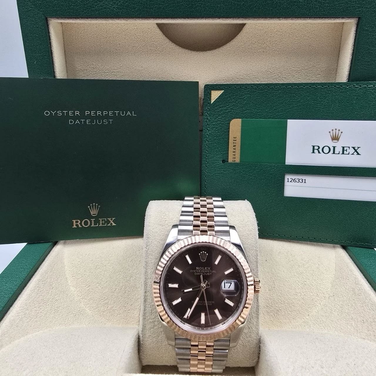 May be an image of wrist watch and text that says 'OYSTERPERPETUAL UAL OYSTER PERPET DATEJUST ROLEX 126331 ROLEX - ٨ ไนิ ノ'