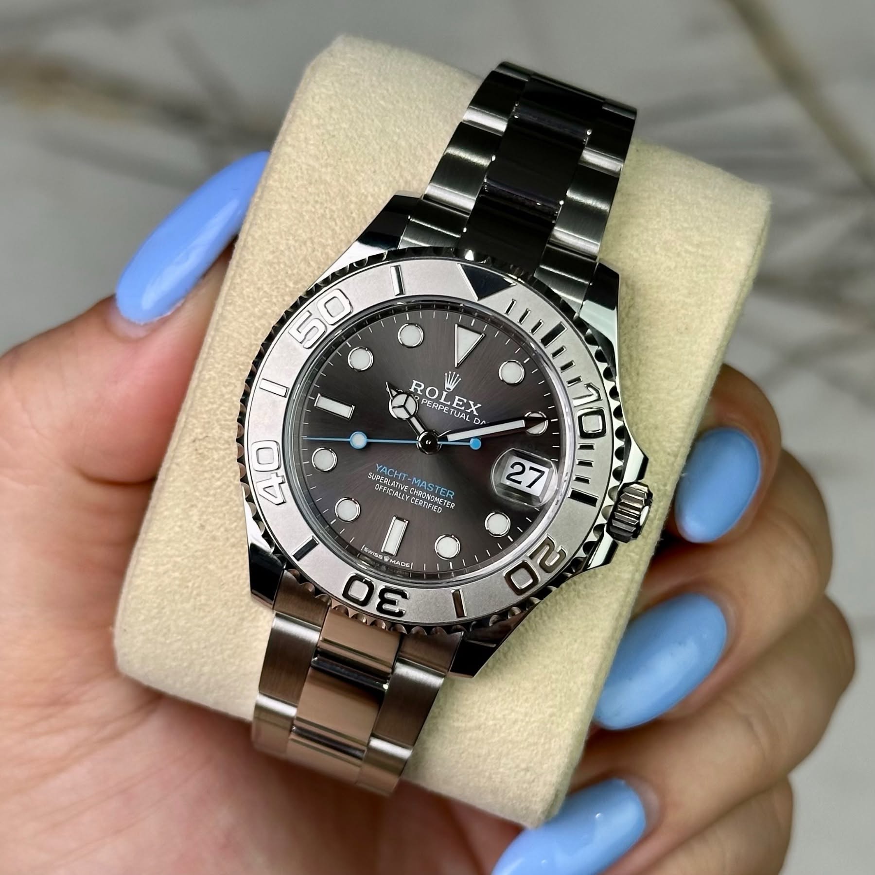 May be an image of wrist watch and text