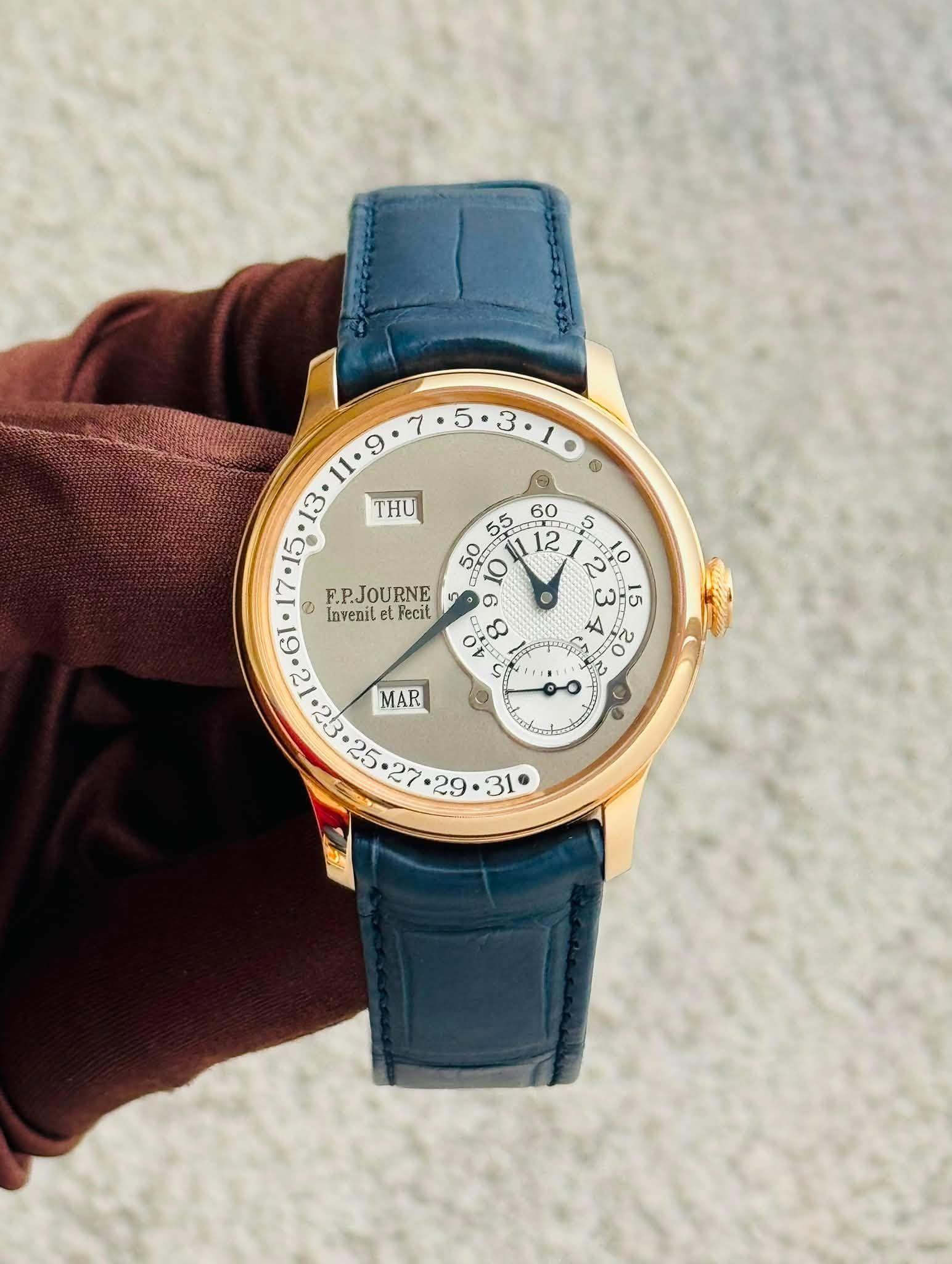 May be an image of wrist watch and text that says ' ® 13 THU 60 55 5 Si 12 F.P.JOURNE 6l Invenil et Fecit ထ כ س 5n هر o ટ iI G De 23 MAR '