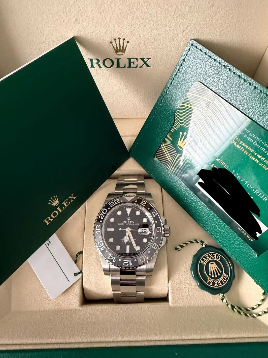 May be an image of wrist watch and text that says 'ROLEX Official guara Thisg This AOrлe gasantie 0 adan detaii detaillan detaule Rolex guarantee SP MODEL Retailer…