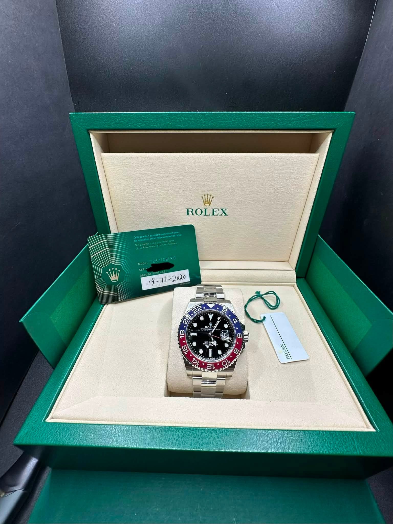 May be an image of wrist watch and text that says 'W ROLEX PIR ロ 0 2L A 2 P ሮ 6 P 9 8 XrTOm'