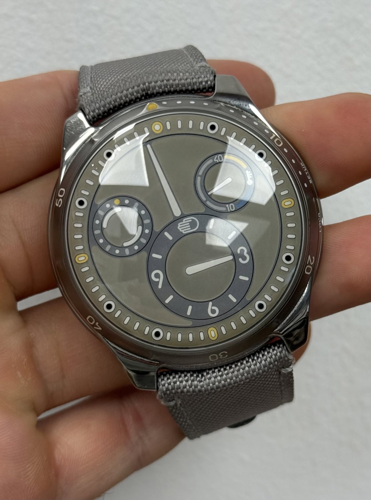 May be an image of wrist watch, strap and timer