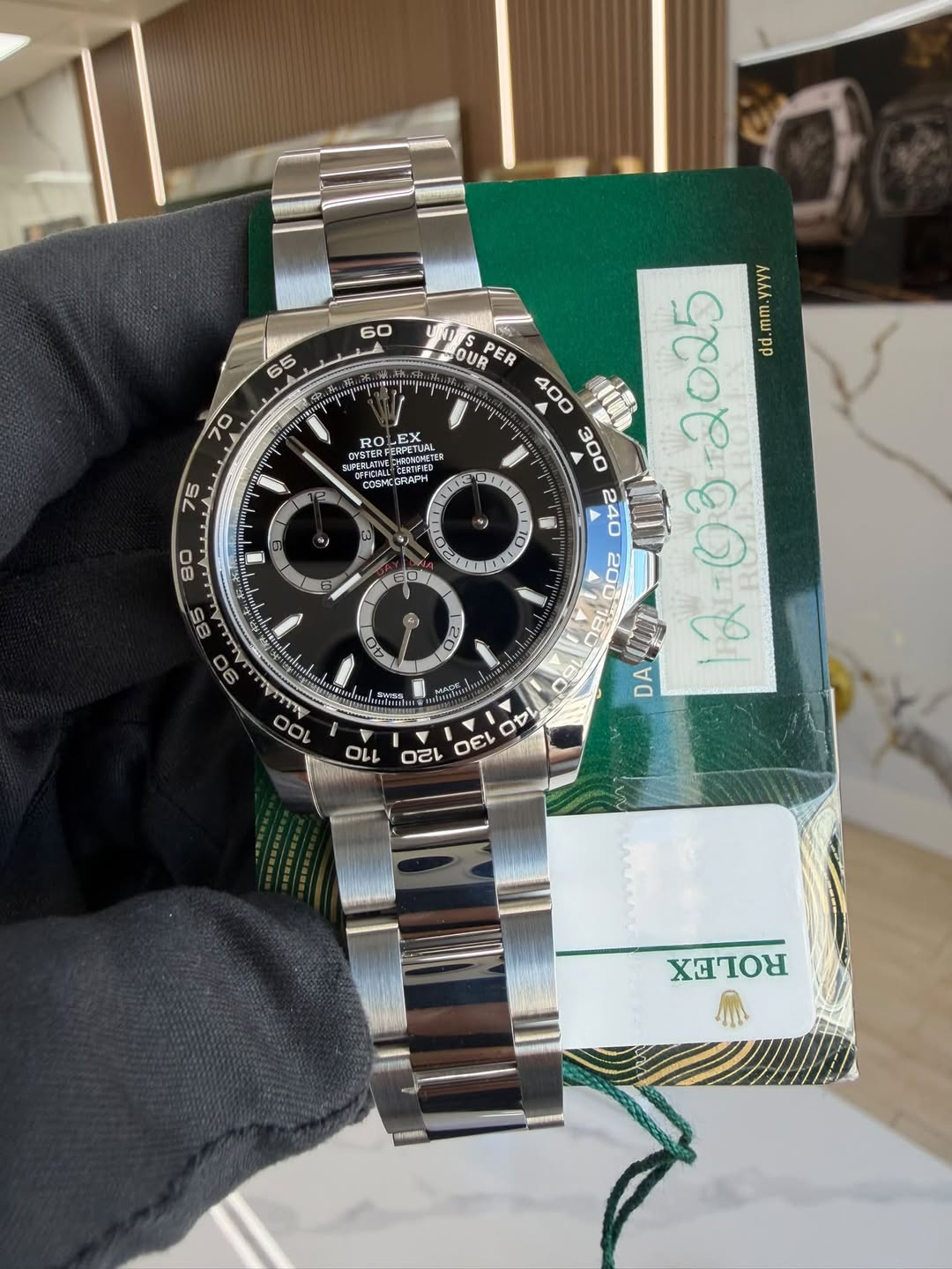 May be an image of wrist watch and text