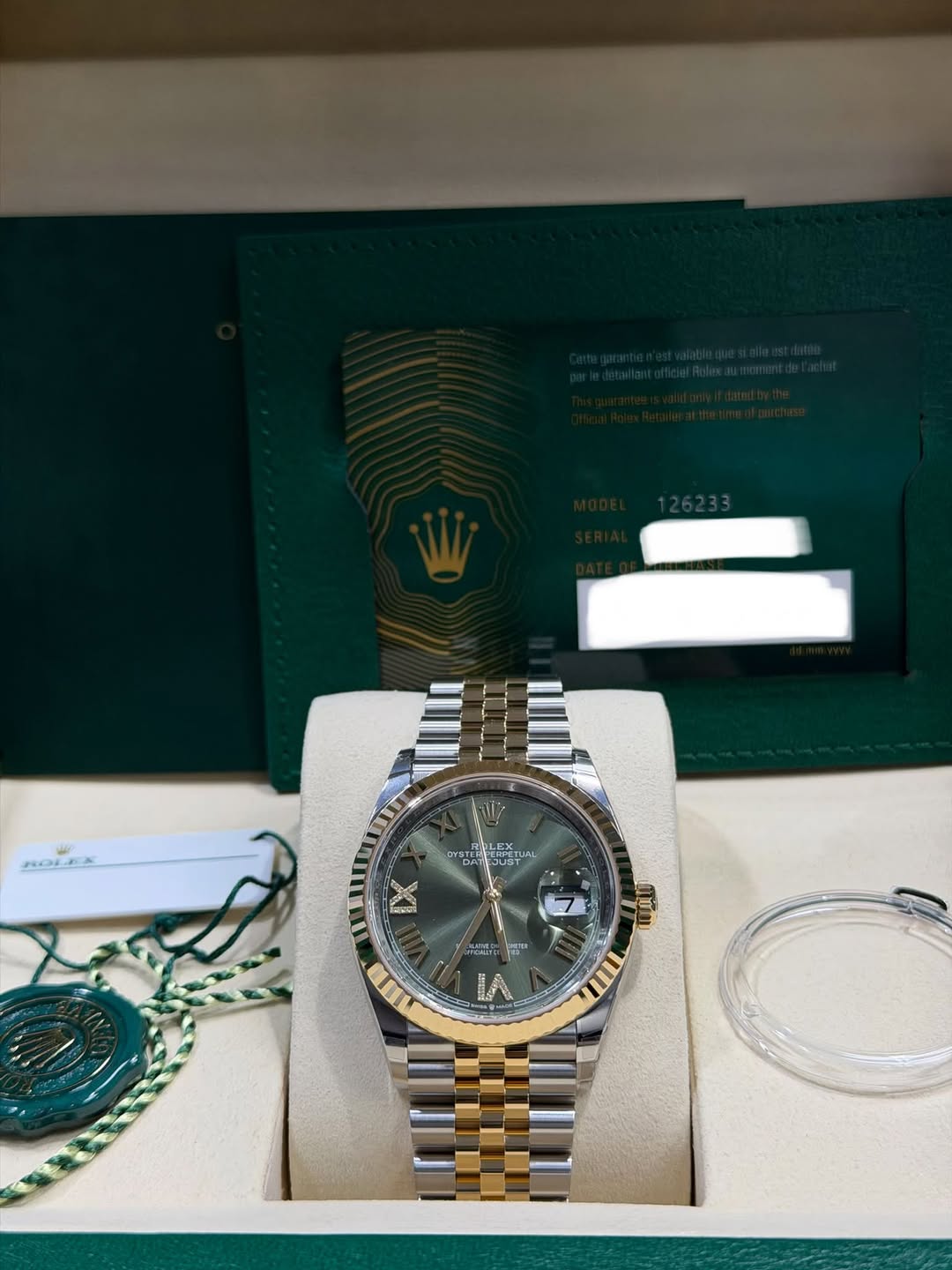 May be an image of wrist watch and text