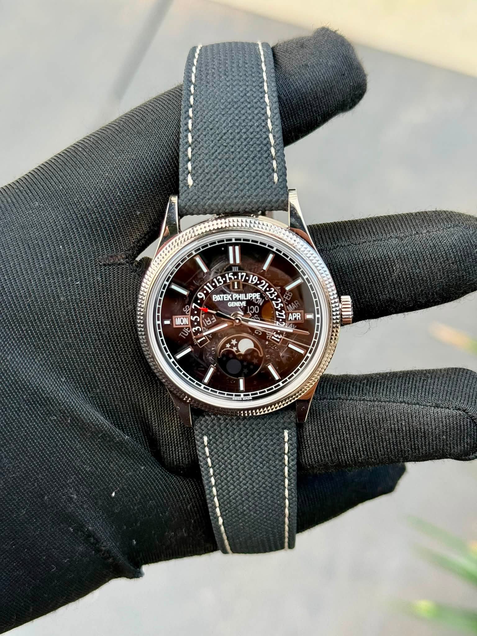 May be an image of wrist watch and text