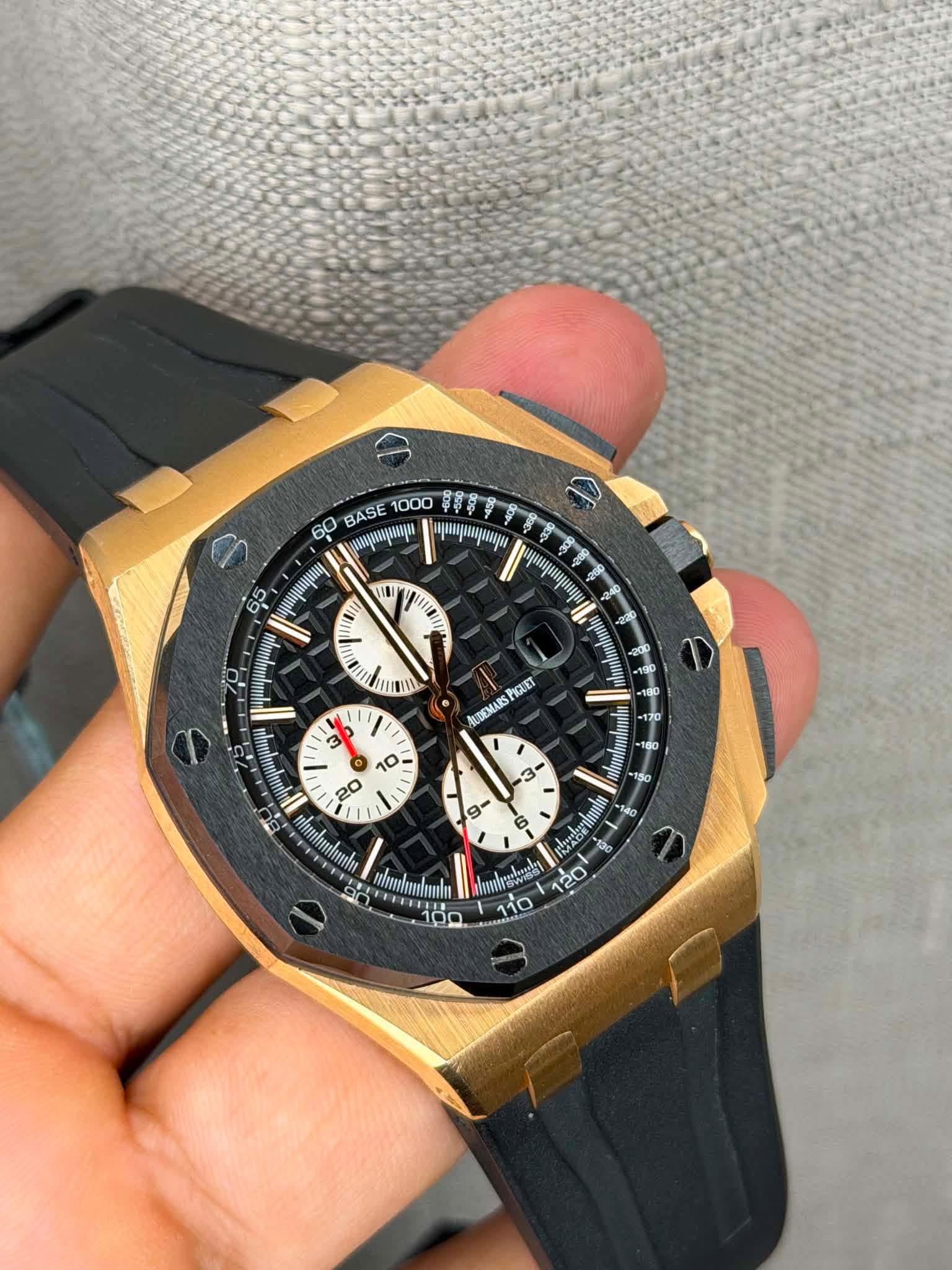 May be an image of wrist watch and text