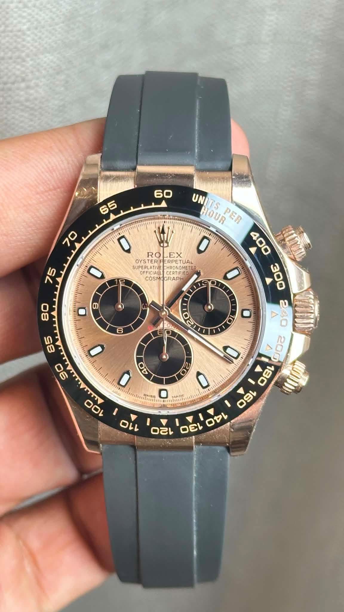 May be an image of wrist watch and text that says ' RO ROLEX 0 OYSTER RFERPETU RPETUAL TUAL eaTK 75 CERTIFIED COSMOGRA UNTTS.PER UNITS HOUR PER អបអ្គ 400 300 Ο אקם ١ا 0 9 80 6 D…