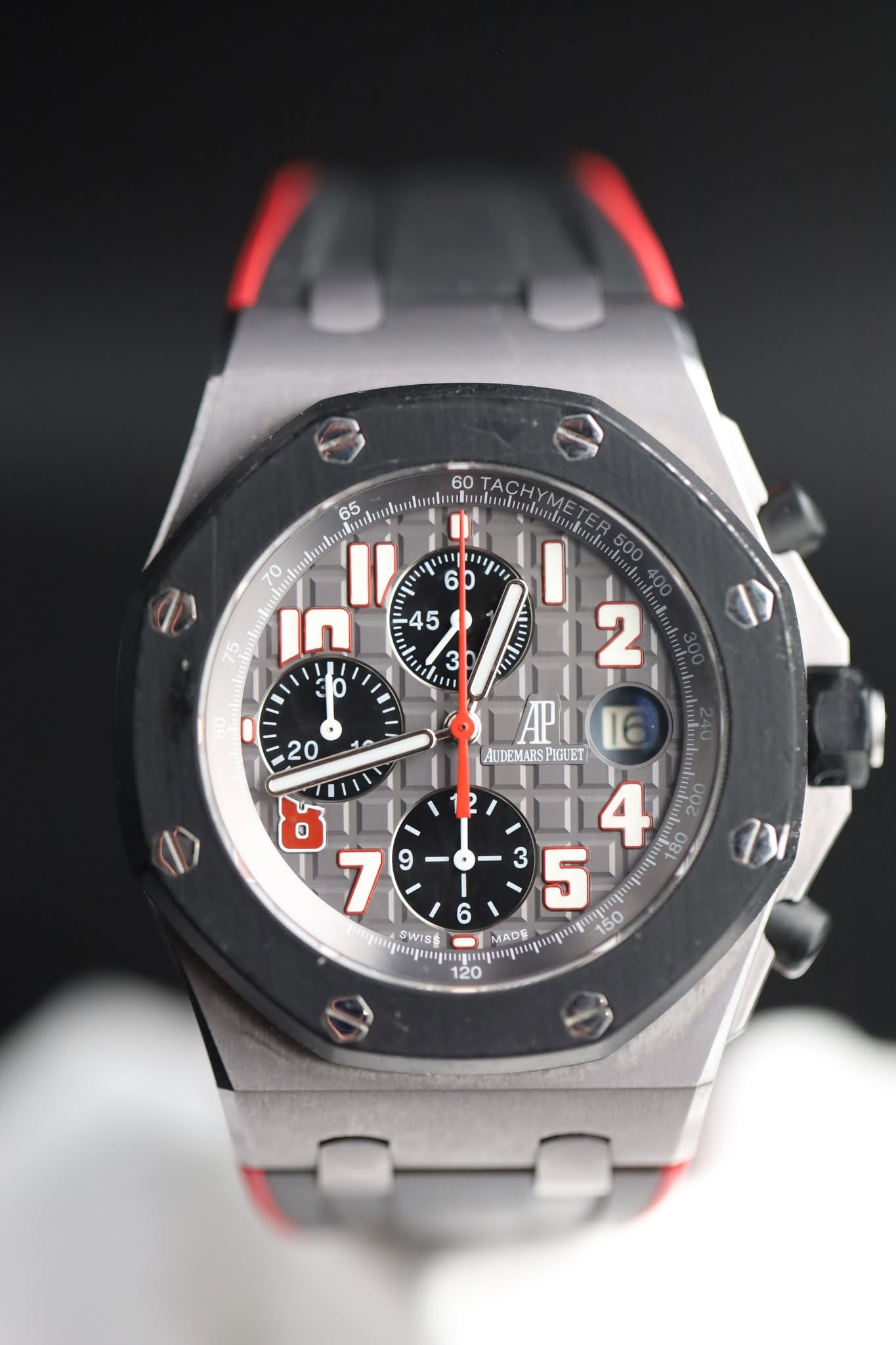 May be an image of wrist watch and text