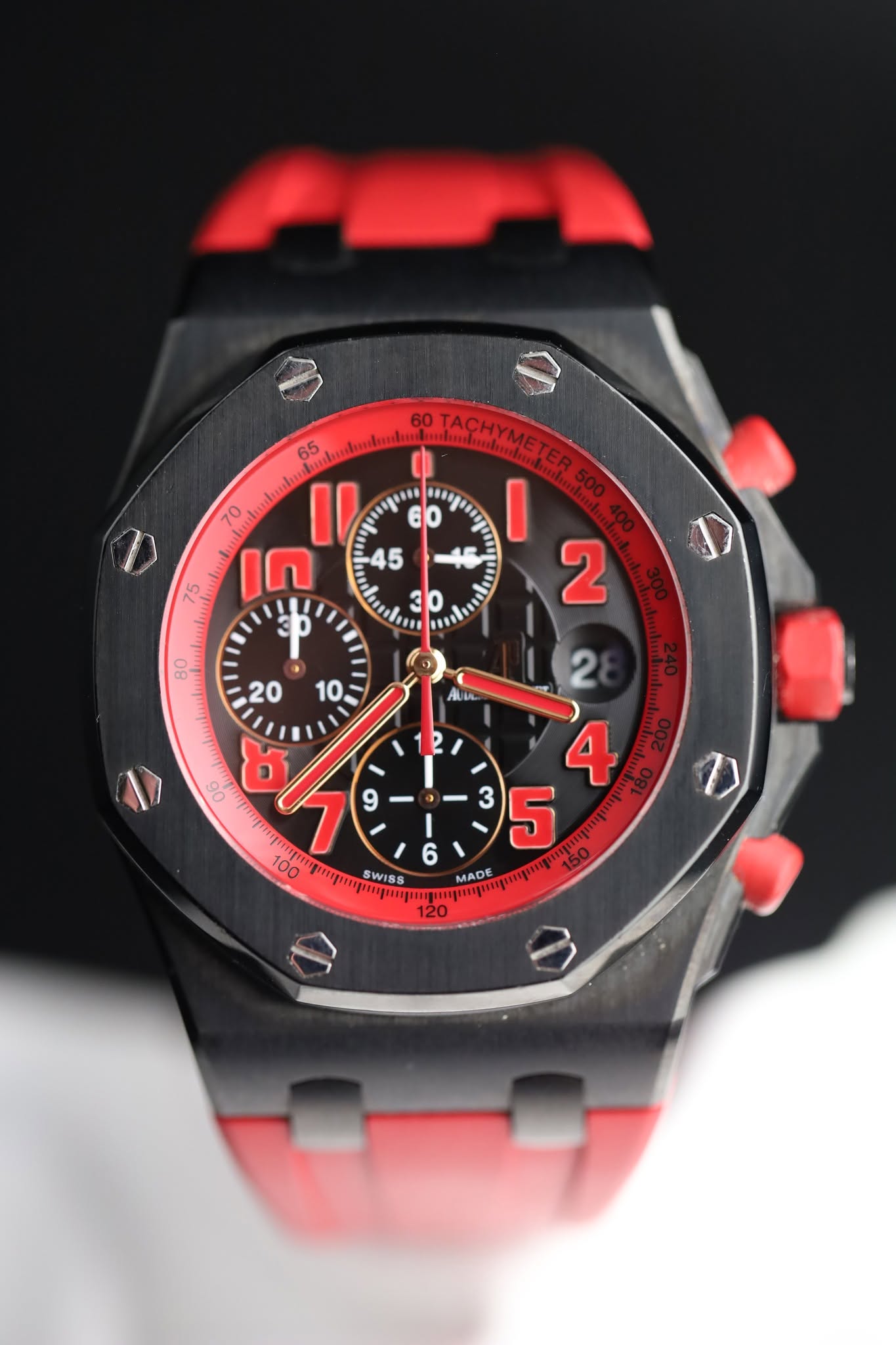 May be an image of wrist watch and text
