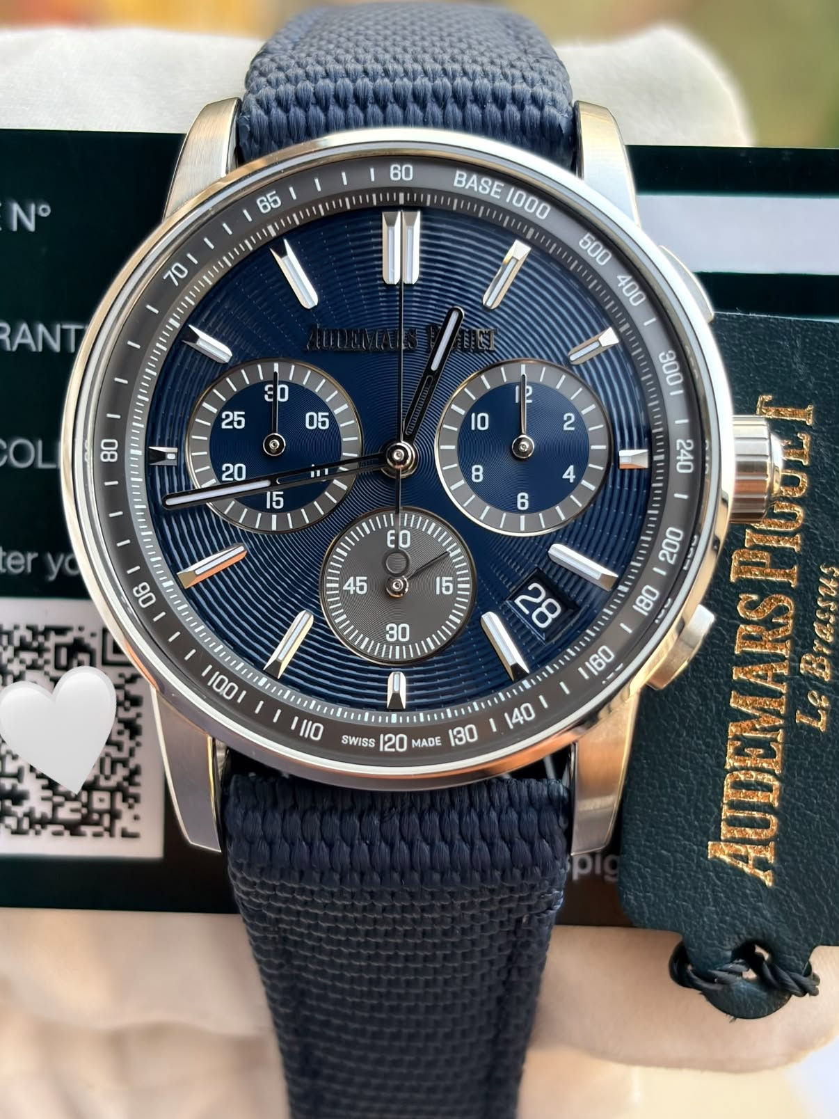 May be an image of wrist watch and text