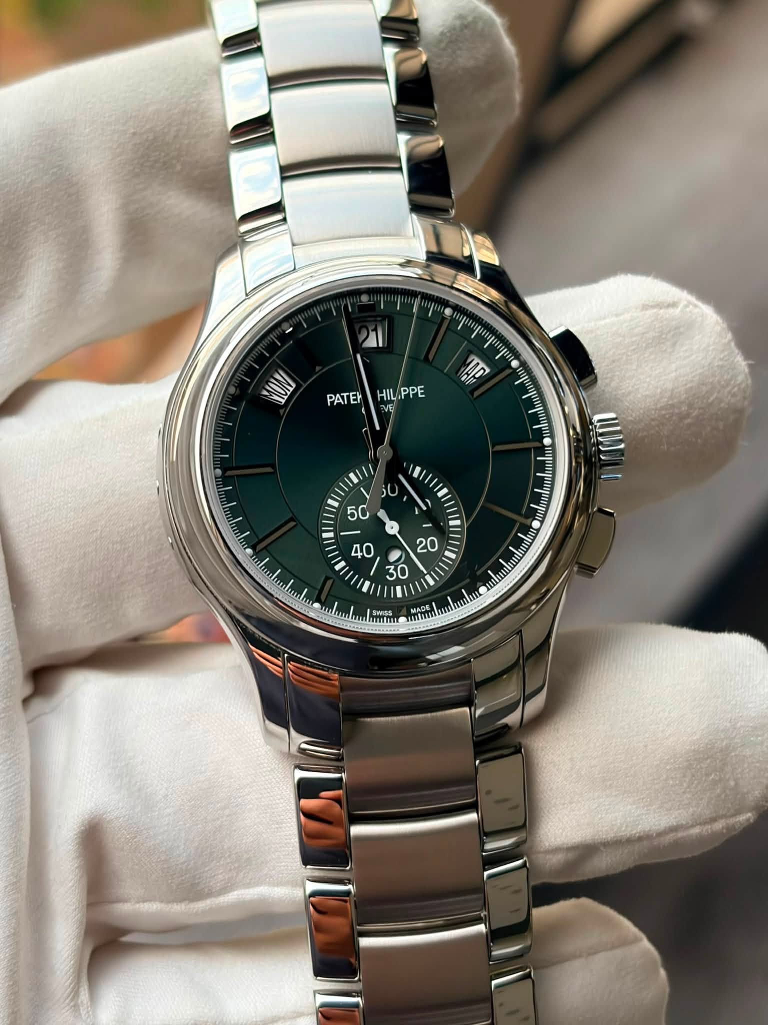 May be an image of wrist watch and text