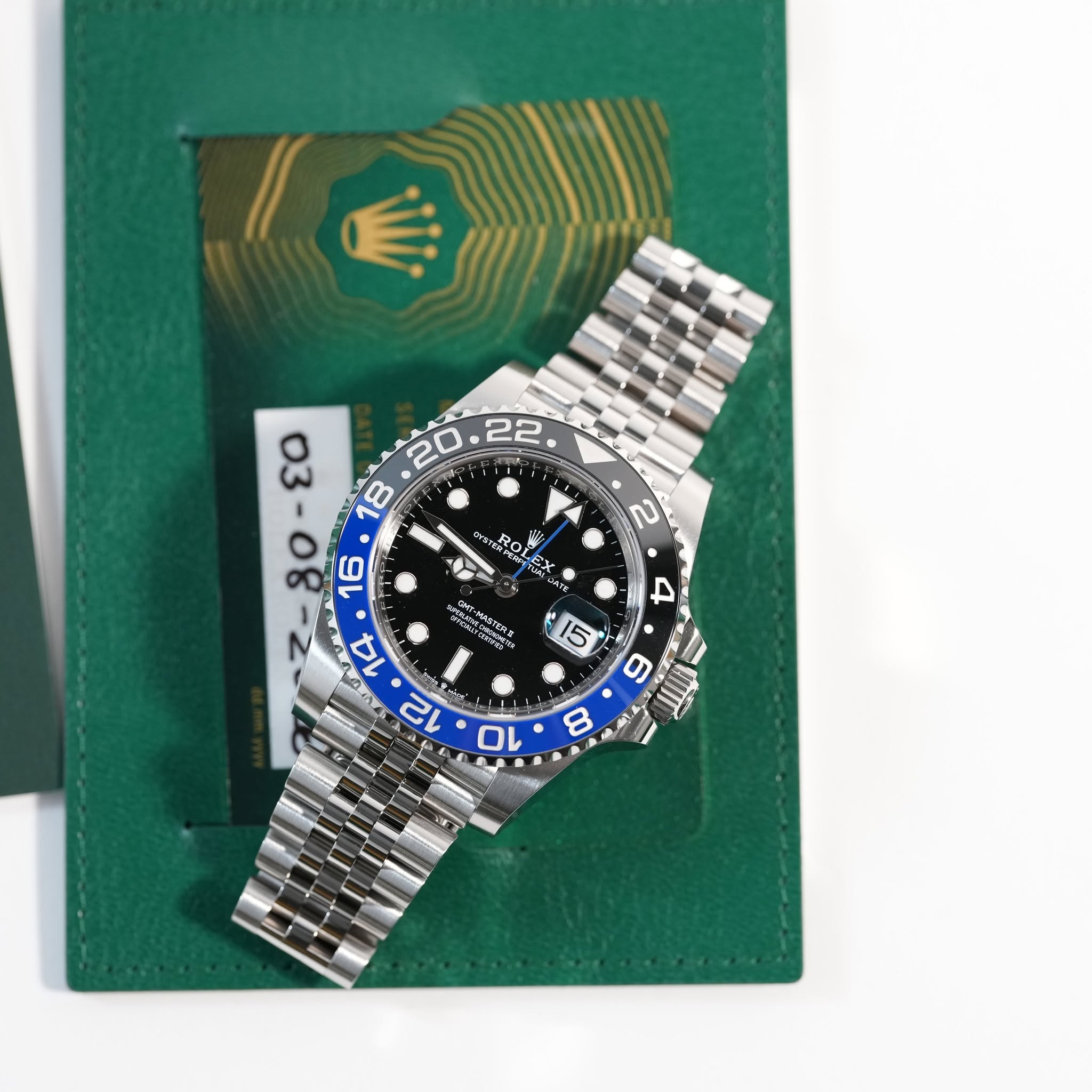 May be an image of wrist watch and text