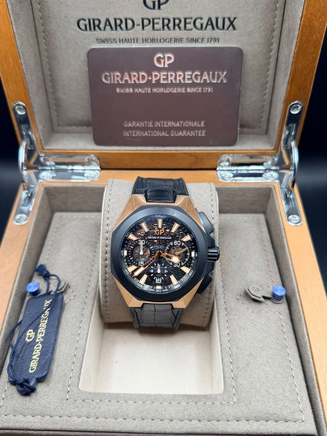 May be an image of wrist watch and text that says 'GIRARD PERREGAUX SWISS HAUTE HORLOGERIE SINCE 1791 GP GIRARD GIRARD-PERREGAUX PERREGAUX SWISS HAUTE HORLOGERIE SINCE 1791…