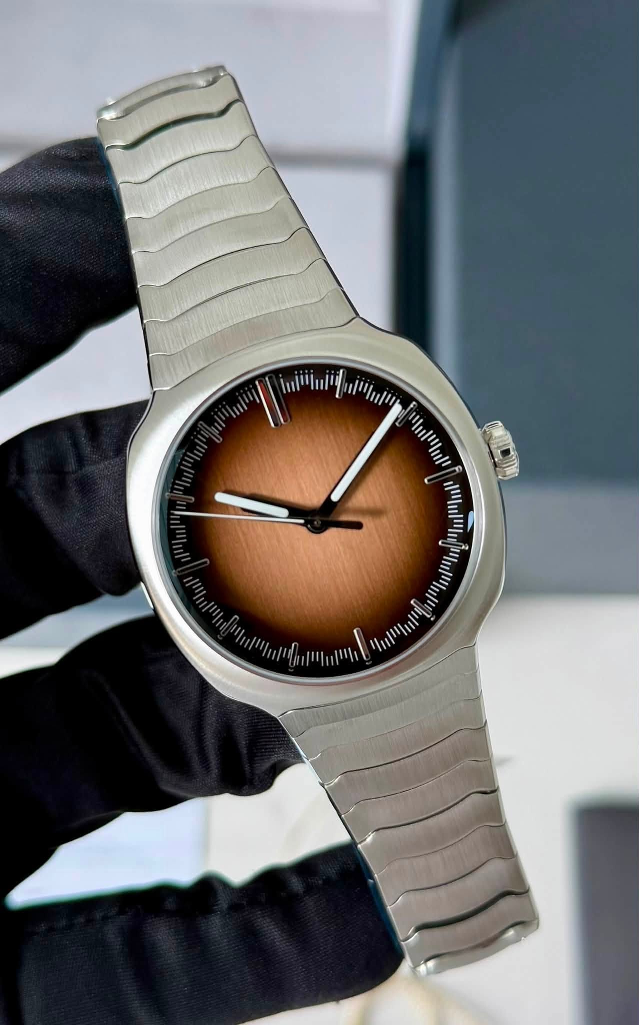 May be an image of wrist watch and text