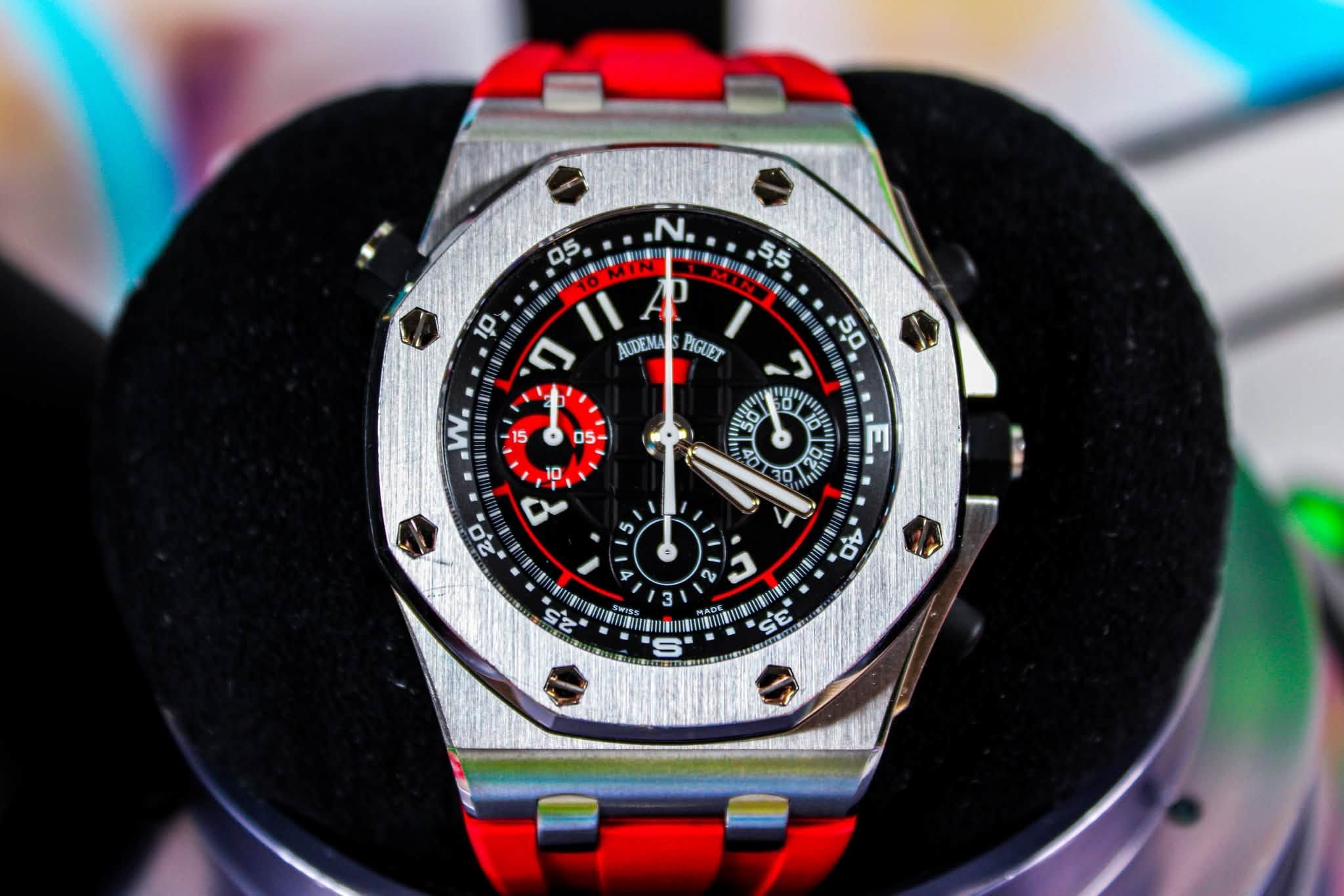 May be an image of wrist watch and text