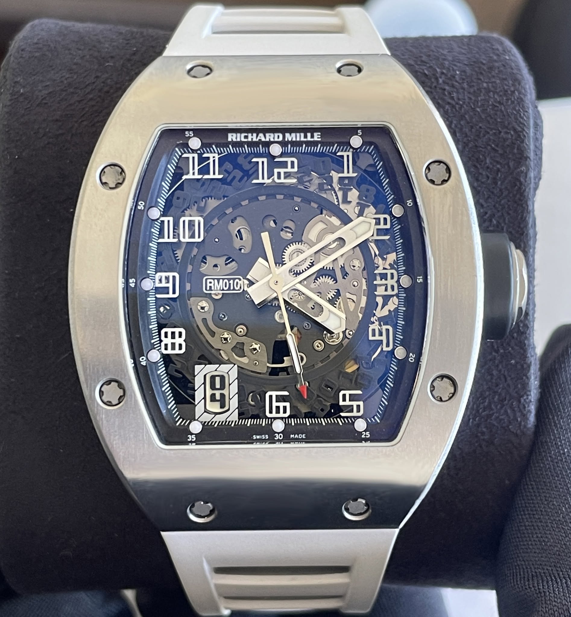May be an image of wrist watch and text