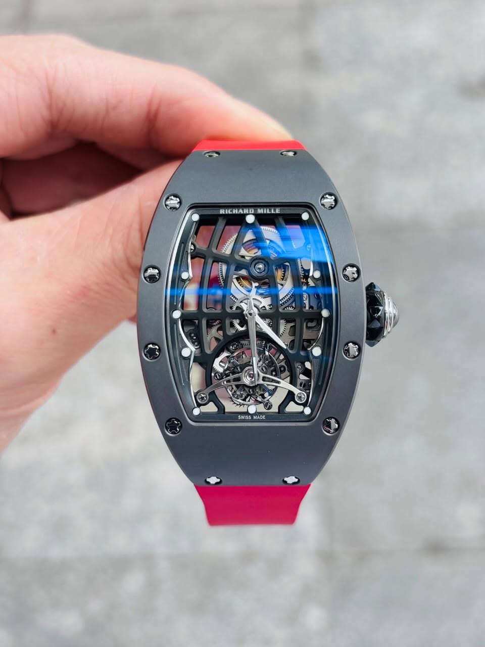 May be an image of digital watch and text that says 'ح 구- RICHAND RICHANDMILLE MILLE 1T ንልት 1 2 SWISS MADE'