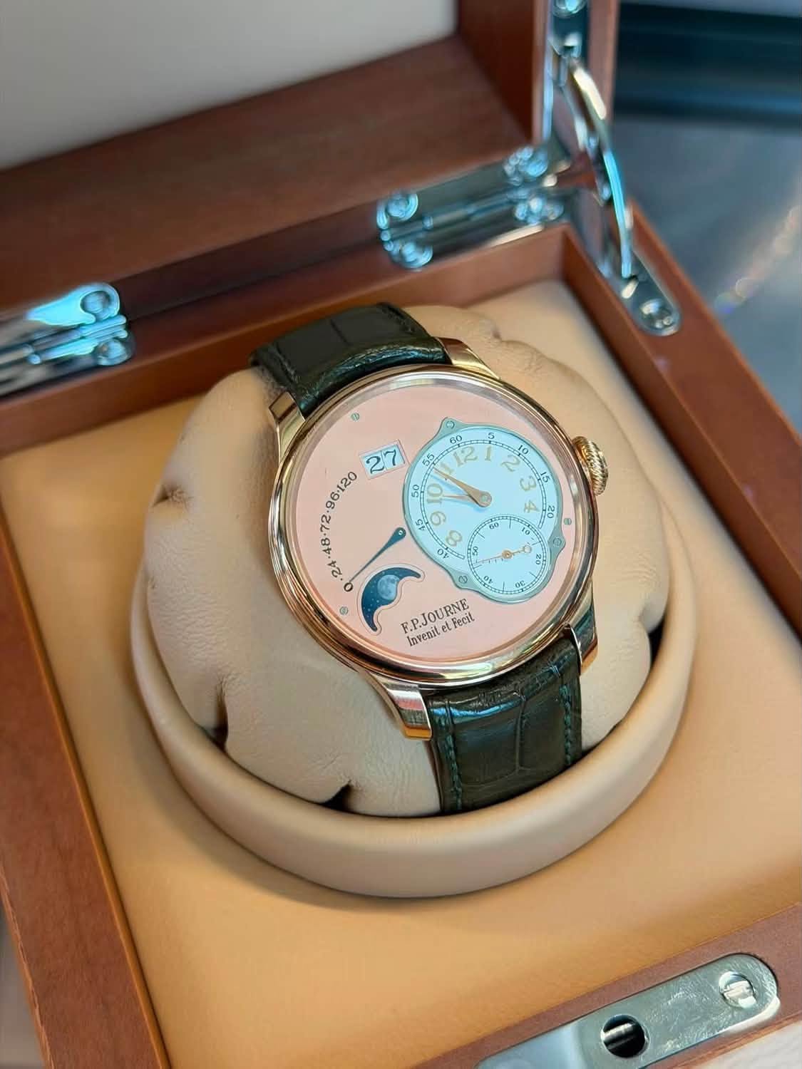 May be an image of wrist watch and text