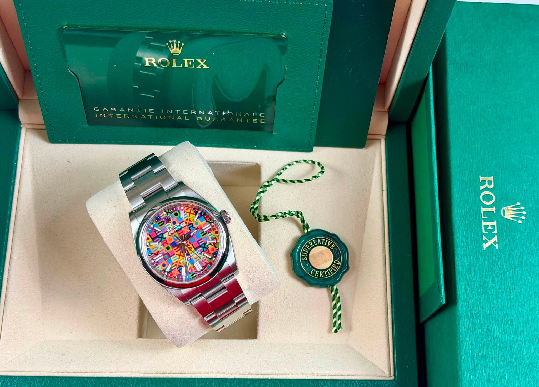 May be an image of wrist watch and text