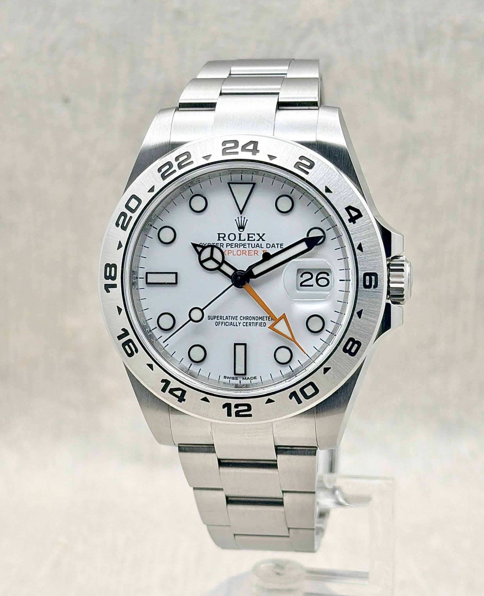 May be an image of wrist watch and text that says '24 22 20 O 2 Miiz O 4 ROLEX EX ROI PERPETUAL DATE ب LPLORER 18 26 6 SUPERLATIVE UPERLATIVECHAONOI CHROMOmET OFFICALLYC…