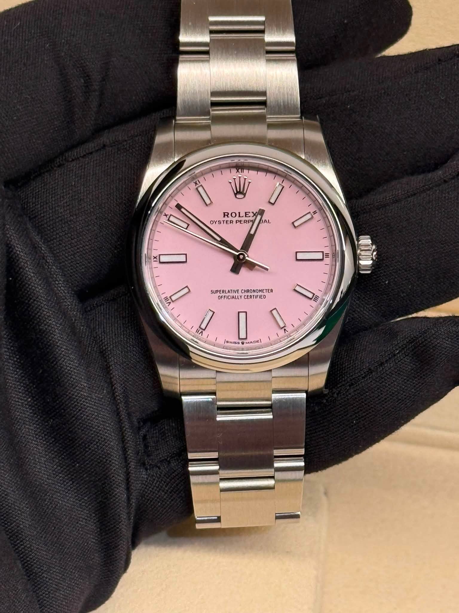 May be an image of wrist watch and text