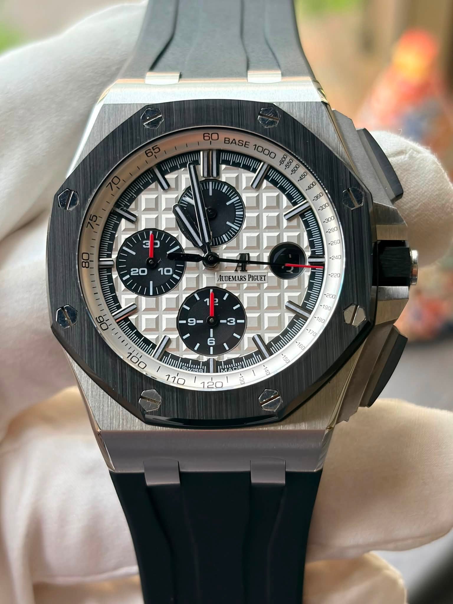 May be an image of wrist watch and text