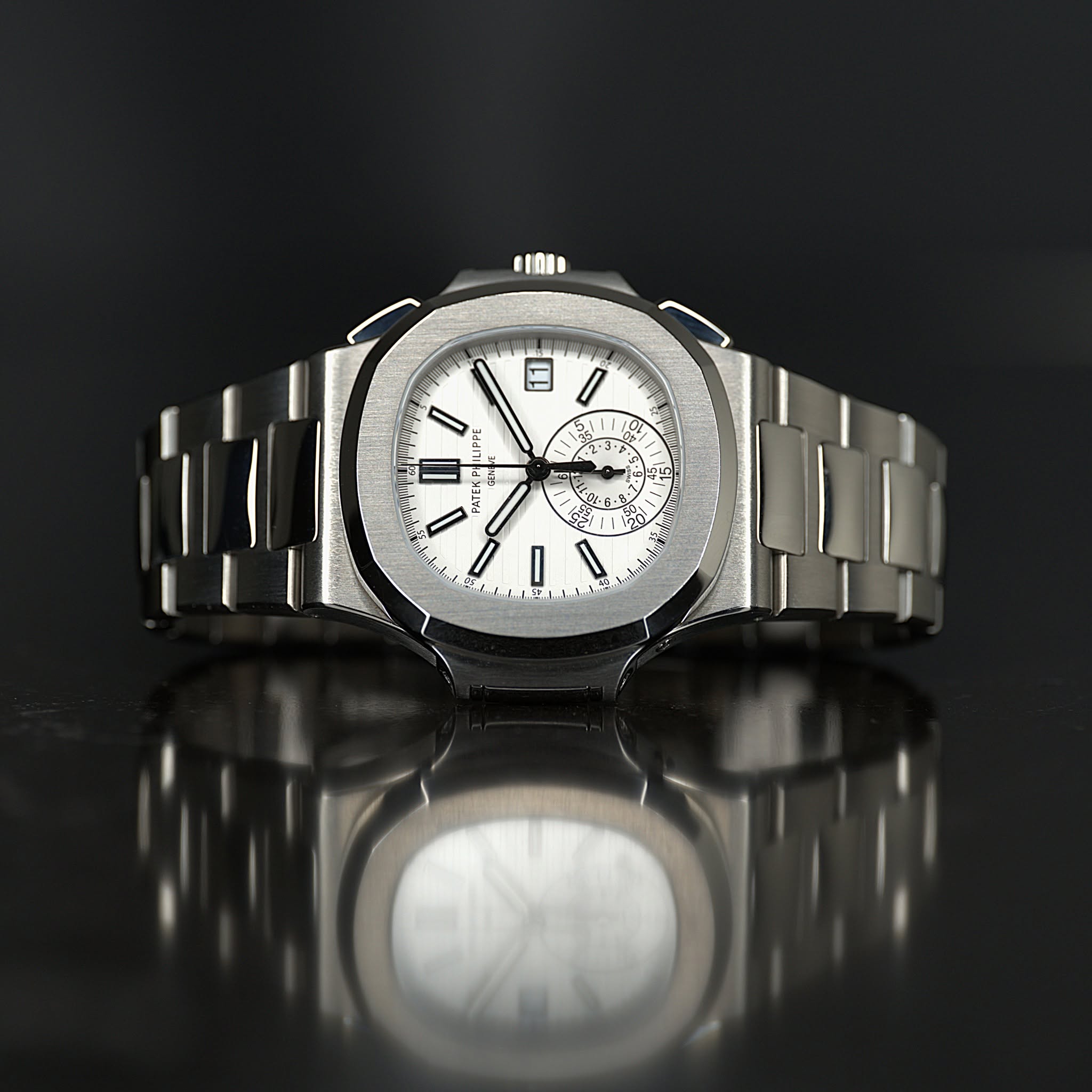May be an image of wrist watch and text