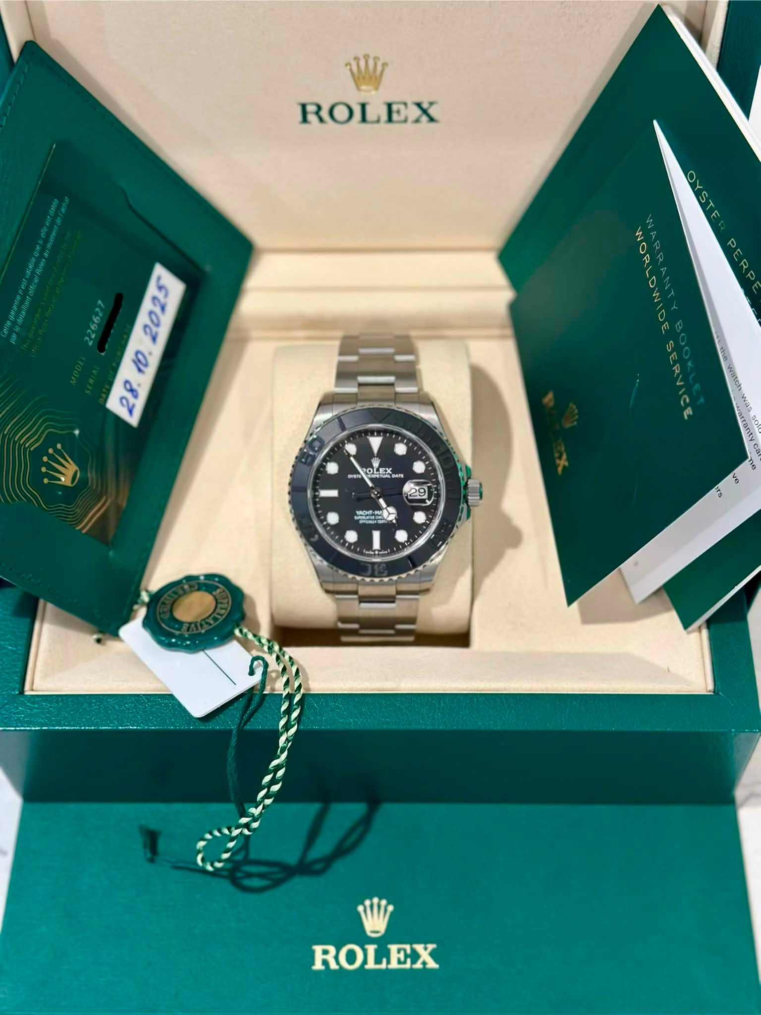 May be an image of wrist watch and text that says 'W ROLEX . NORLOW o税 EX 29 ー ROLEX'