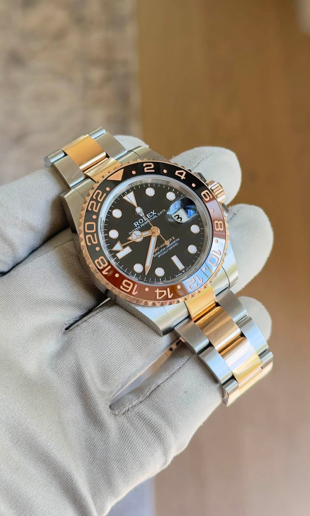 May be an image of wrist watch and text
