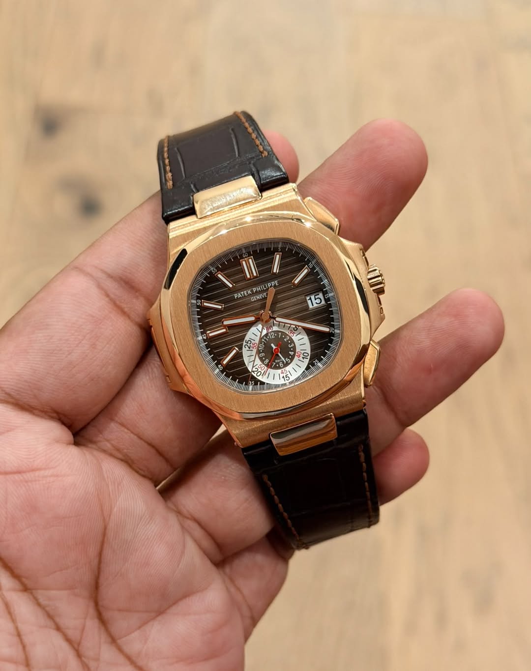 May be an image of wrist watch and text