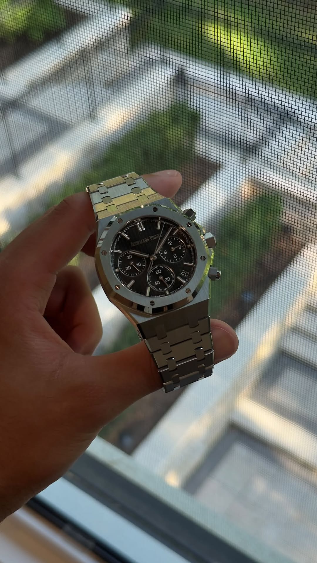 May be an image of wrist watch