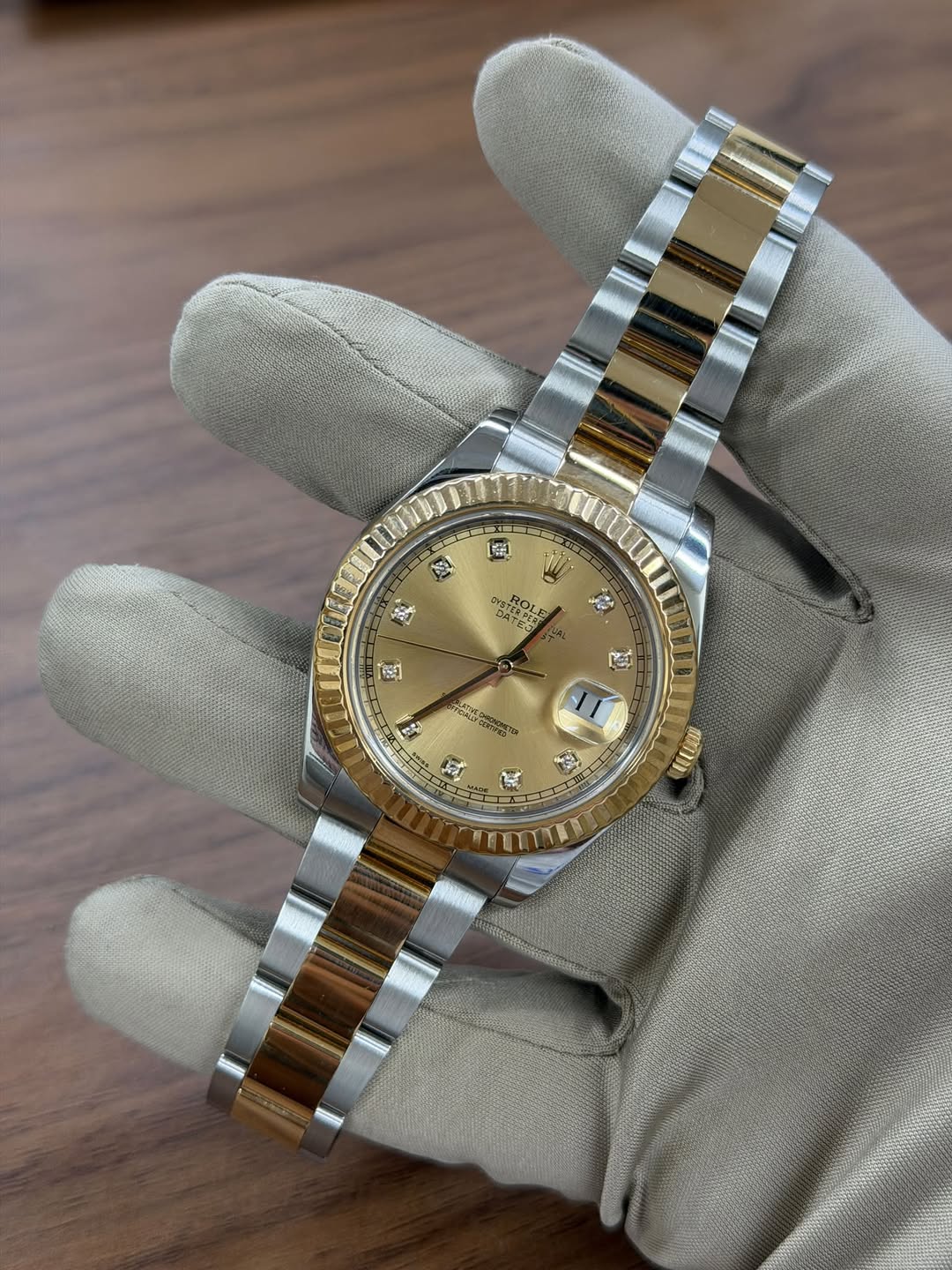 May be an image of wrist watch and text