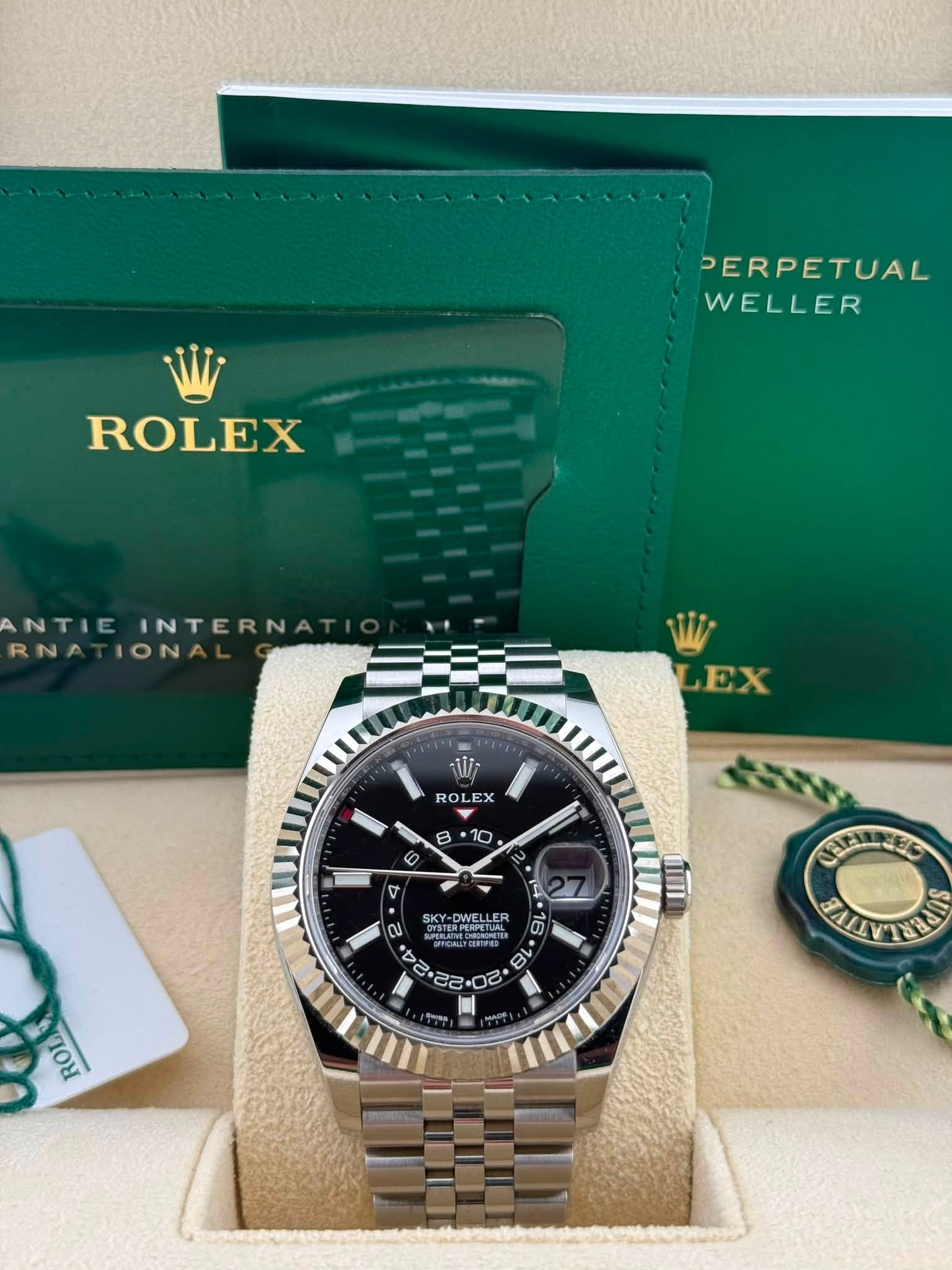 May be an image of wrist watch and text