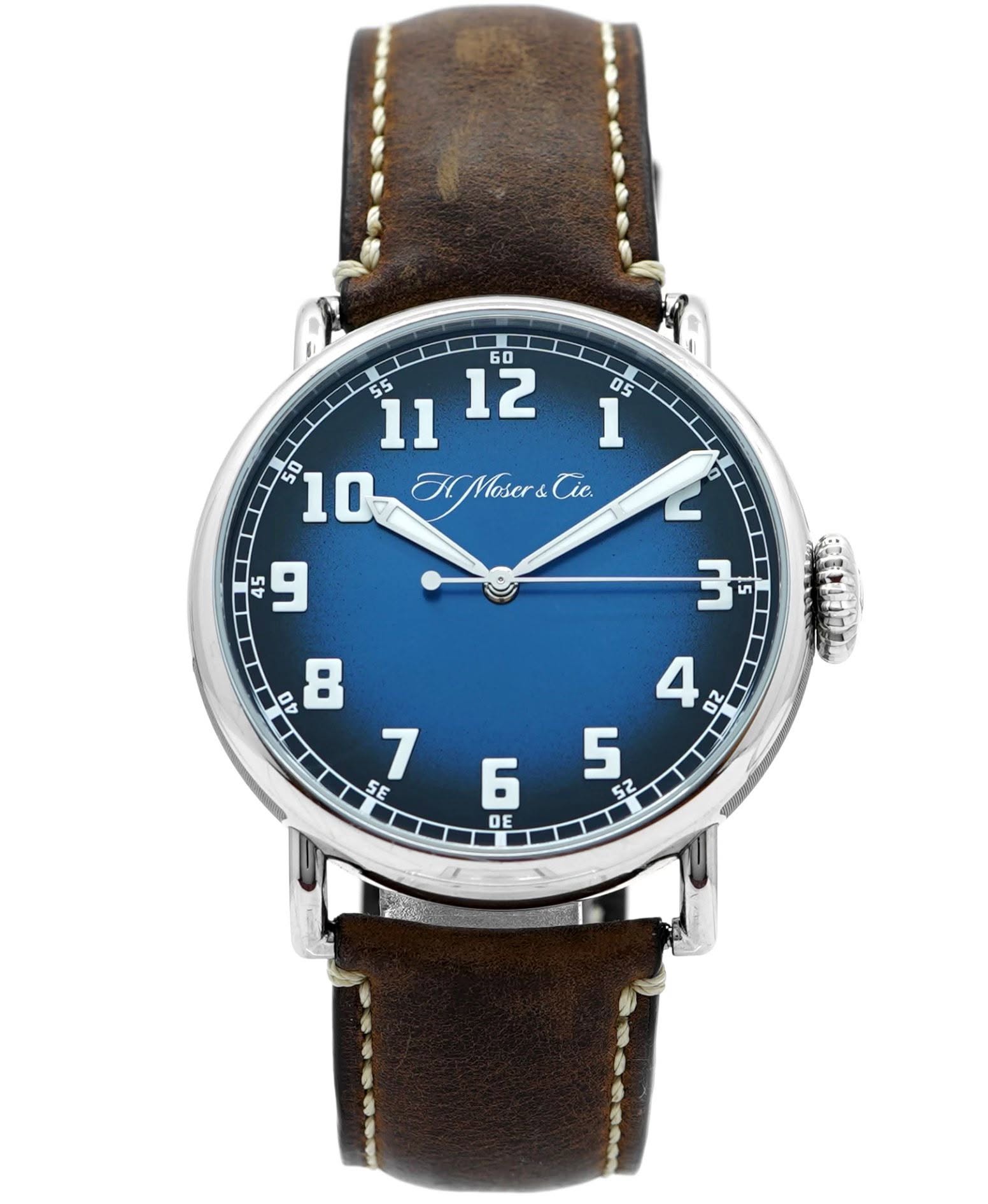 May be an image of leather, wrist watch and text that says ' HMoser&Cic. 1Mcbe Cie. 55 4 و SE DE'