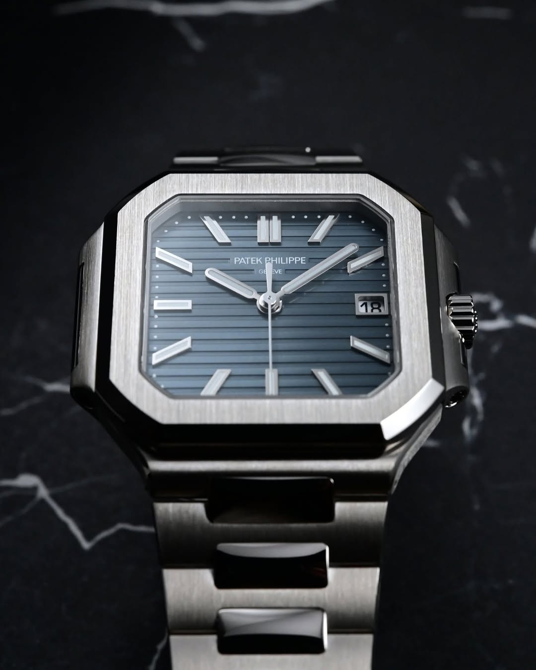 May be an image of wrist watch and text that says 'PATEKPHILIPPE PATEK PHILIPPE e EVE EVE VE E'