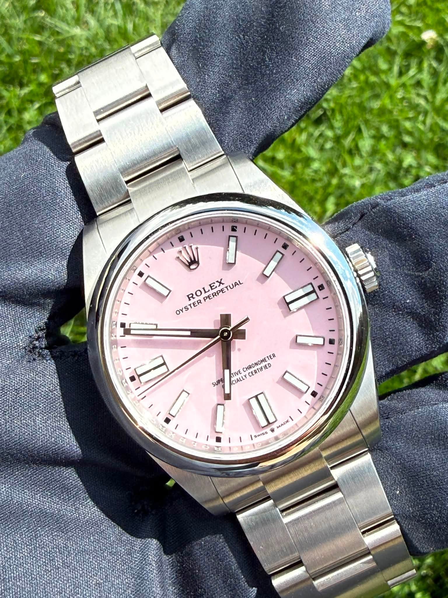 May be an image of wrist watch and text that says 'I I ROLEX PERPETUAL OYSTER Il 8 P - STIVE CHRONOMETER TER CERTIFIED SUPE CIALL II ٢ I AADE, MADE| AA OW Sm95s'