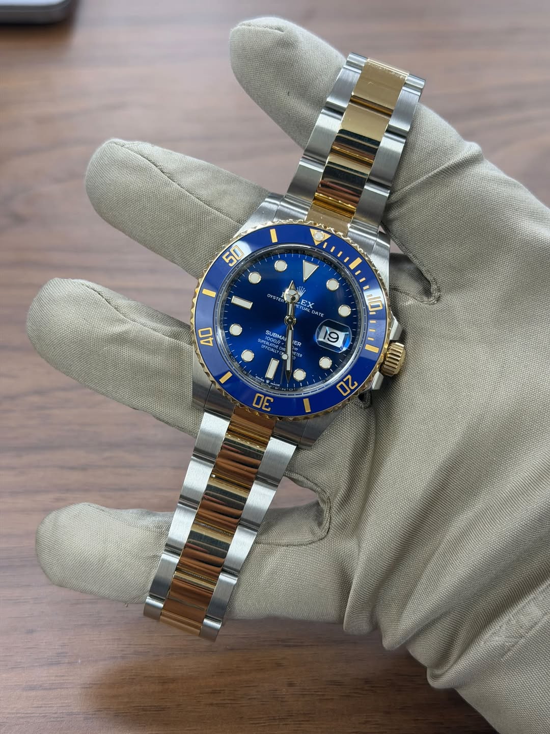 May be an image of wrist watch and text