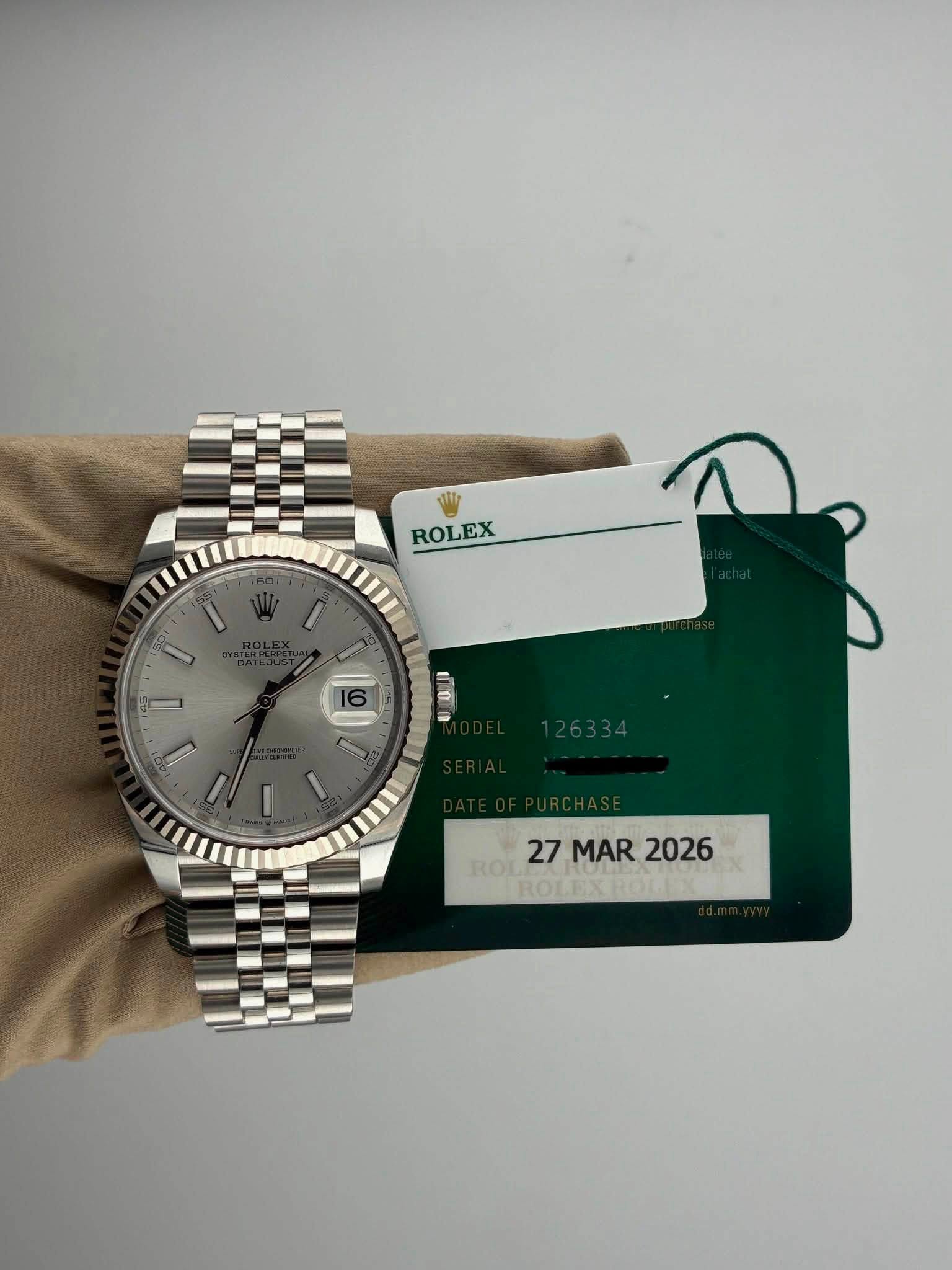 May be an image of wrist watch and text that says 'M ROLEX MAR 27MAR2026 2026 ROL ROLEX RO'